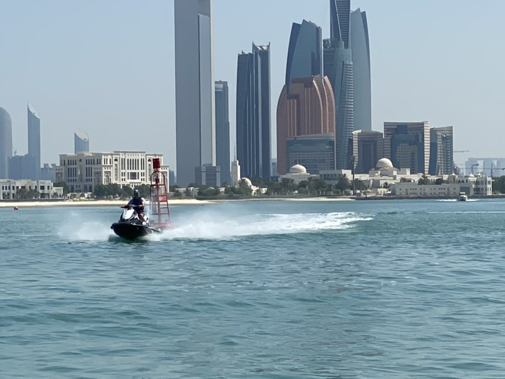 Jet ski with the Abu Dhabi skyline