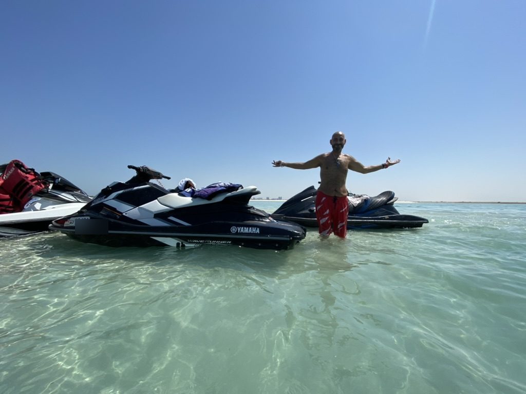 Jet skis in turquoise shallows in Abu Dhabi