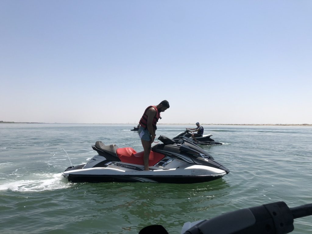 Two skis, calm water