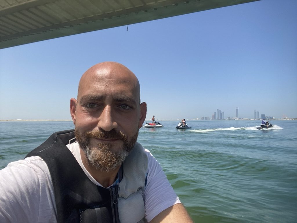 Captain Sam on the water with riders in Abu Dhabi